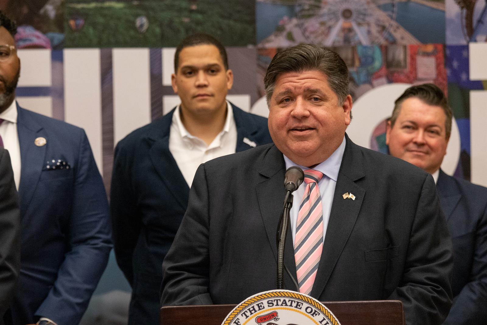 Gov. JB Pritzker speaks to reporters