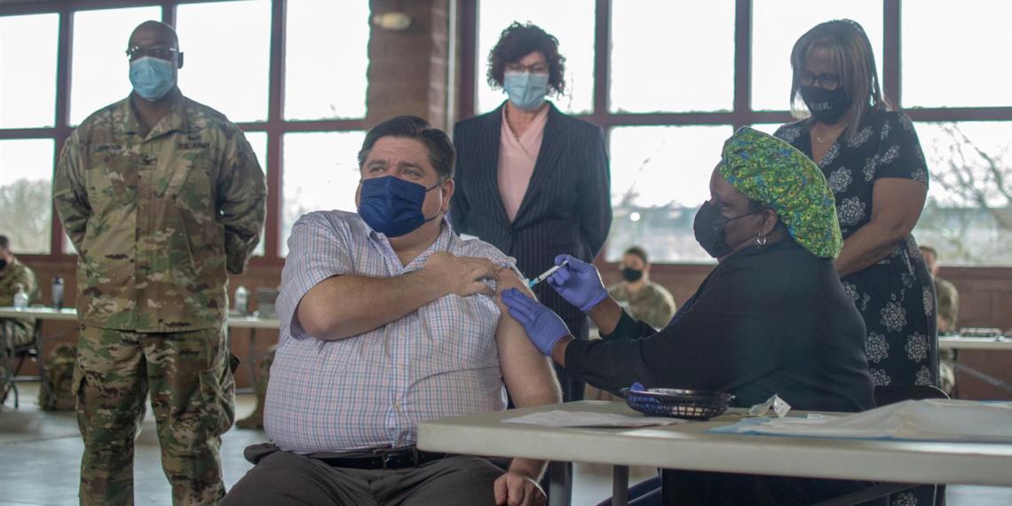 Gov. JB Pritzker is pictured after receiving his COVID-19 vaccine in March. (Capitol News Illinois file photo by Jerry Nowicki)