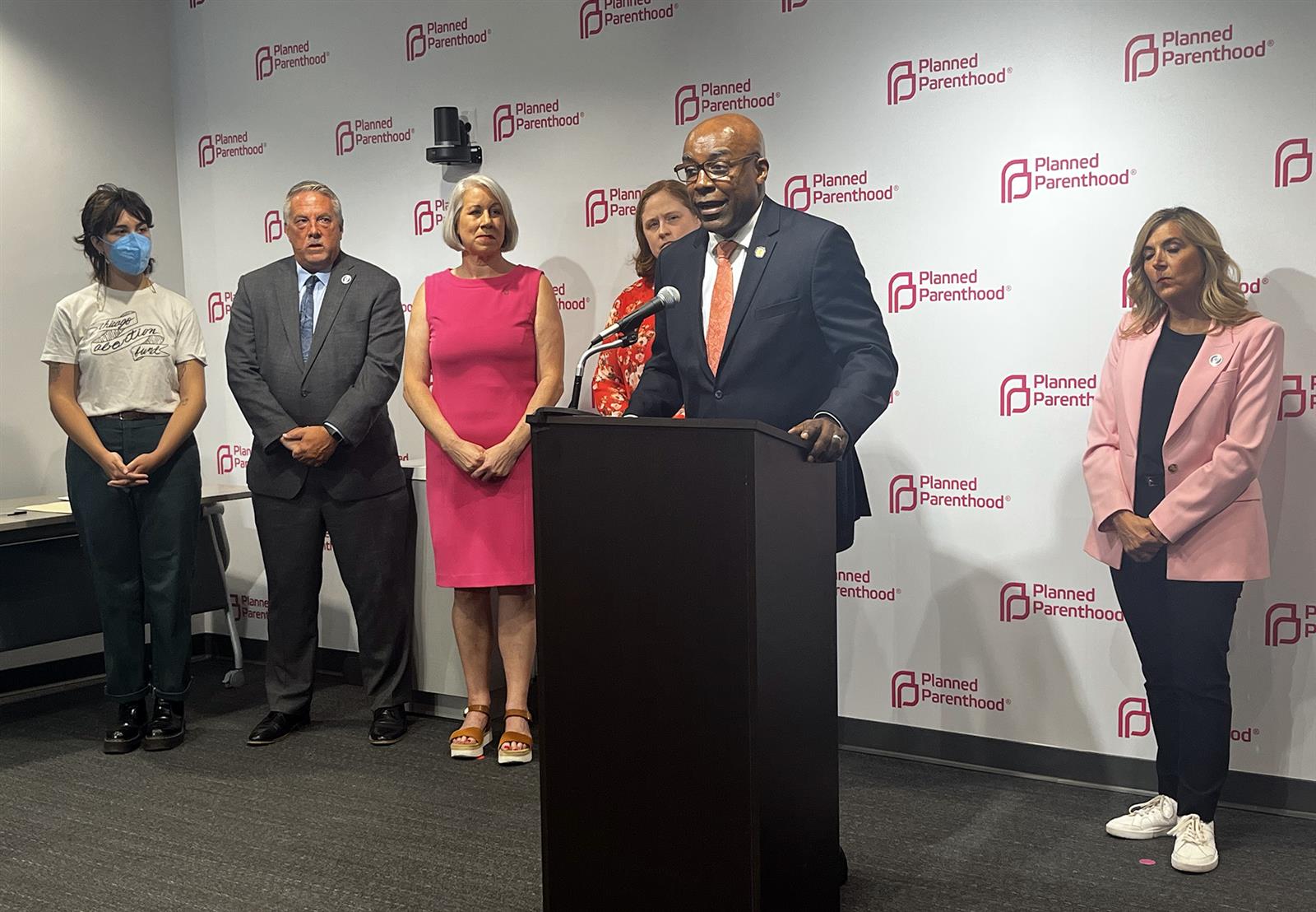 Kwame Raoul stands with fellow abortion rights advocates