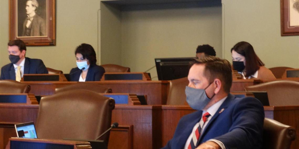Republican Rep. Tim Butler (front)