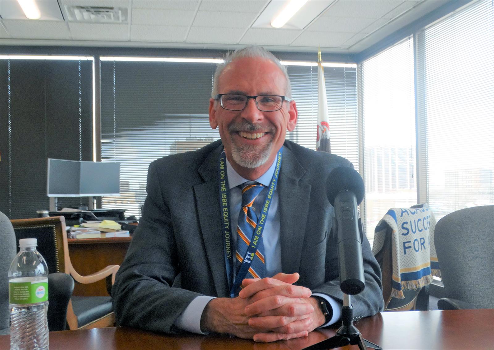 Illinois State Superintendent of Education Tony Sanders is encouraging public and nonpublic organizations to apply for funding to expand the availability of preschool in areas of the state that are currently underserved. He is pictured in his Springfield office. (Capitol News Illinois photo by Peter Hancock)