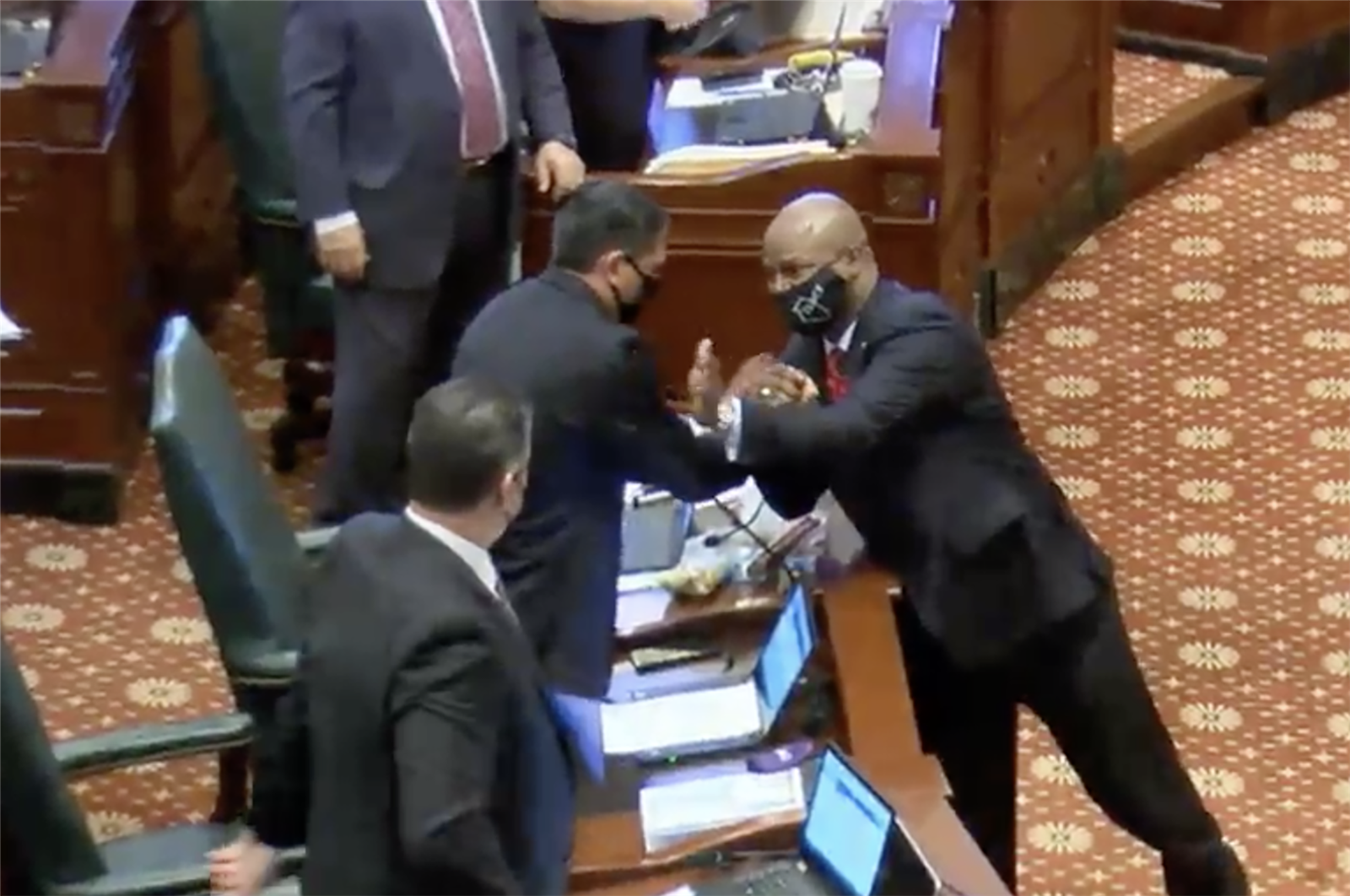 Emanuel "Chris" Welch (right) congratulates Rep. Anthony DeLuca
