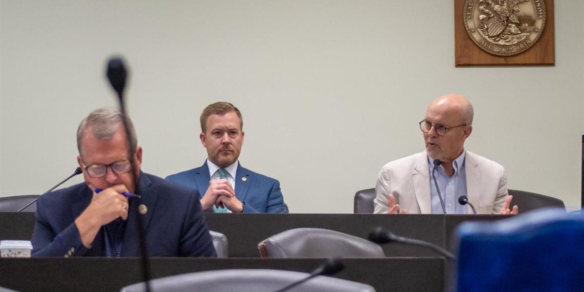Sen. Don DeWitte and Rep. C.D. Davidsmeyer are pictured with Democratic Sen. Dave Koehler
