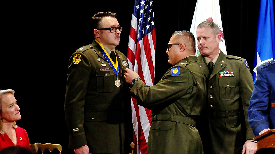 Chaplain Major Chase Wilhelm receives the Bronze Star with Valor