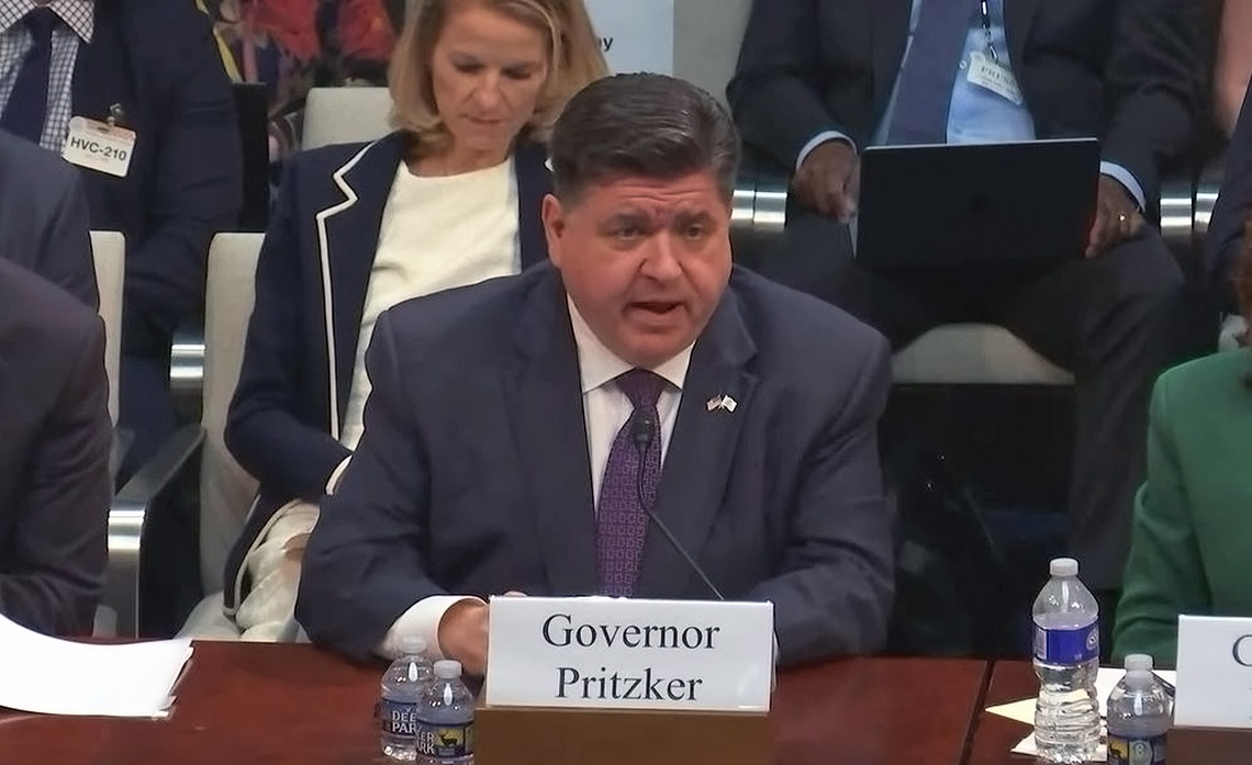 JB Pritzker speaks before the committee