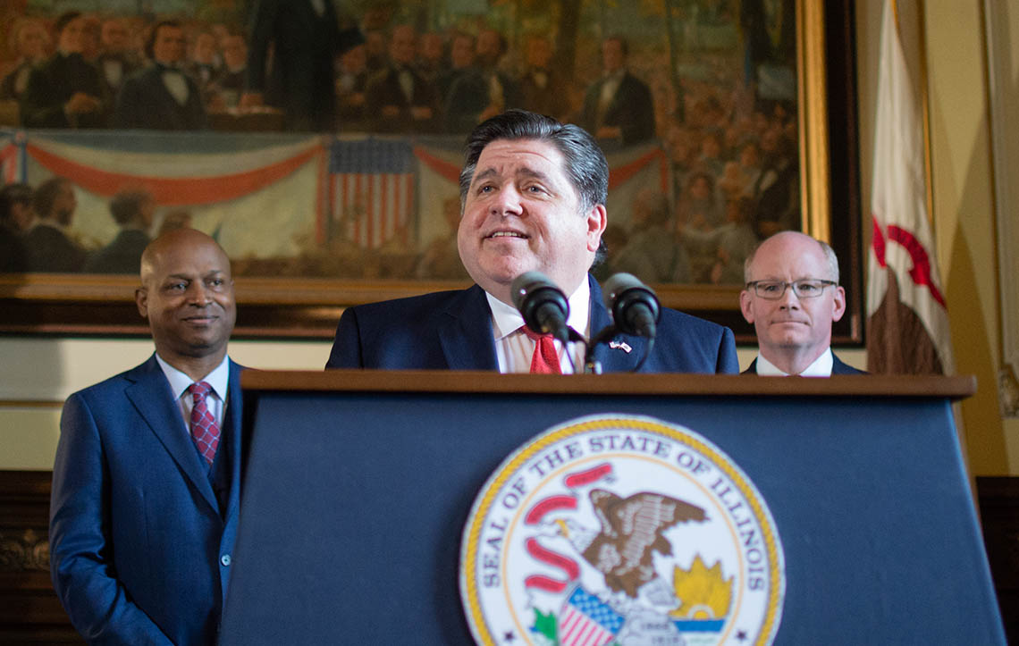 Chris Welch, JB Pritzker and Don Harmon