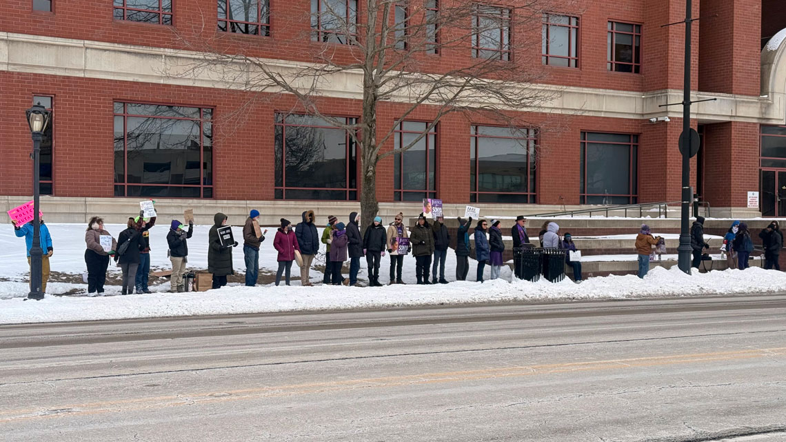 People lined up outside courthouse