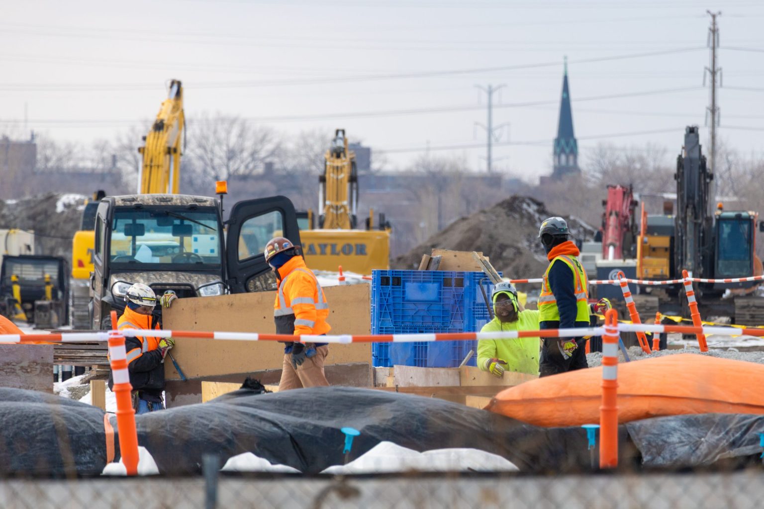 Workers at future site