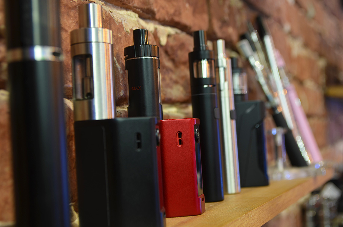 Vaping Devices lined up on a wall