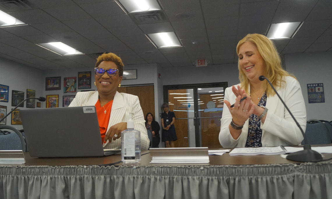 Ronda Dawson seated next to Kirsten Parr