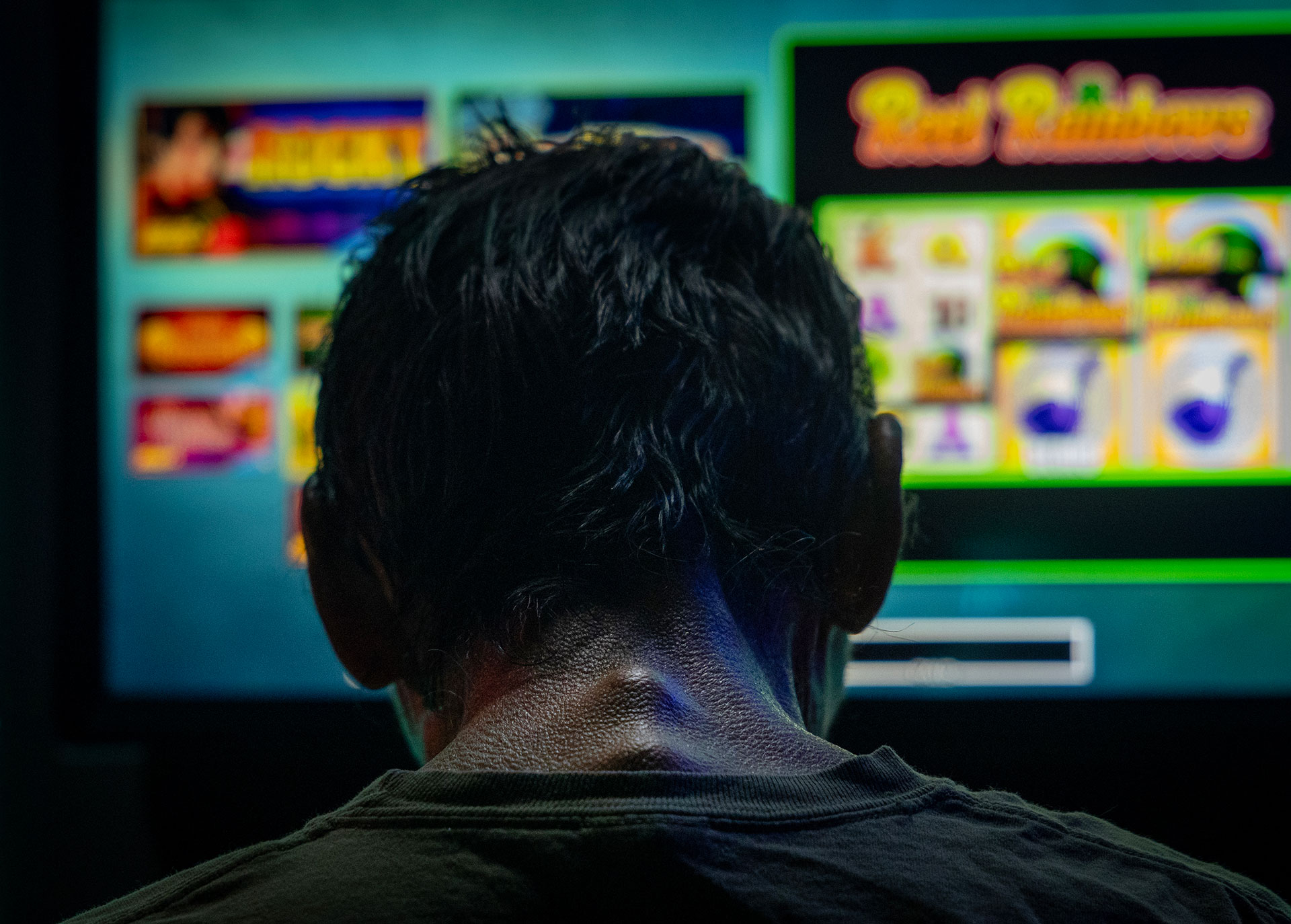 man playing slot machine