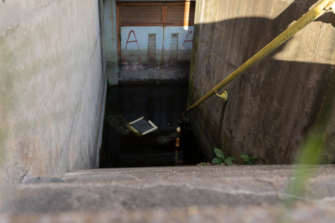 water fills an abandoned stairwell